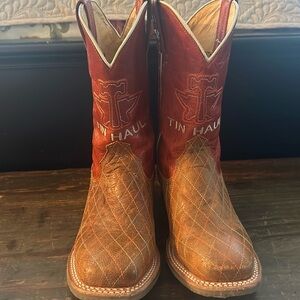 Youth Tin Haul “crossed” cowboy boots with bald eagle sole.